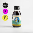 Load image into Gallery viewer, In the centre of the page is a single-serve cocktail in a cute looking small glass bottle, with a black aluminium cap. To the left of the page is a one star Great Taste award logo from 2023, and a purple and yellow logo from the Free From awards for Bronze and commended in 2022 and 2023. The cocktail is a Salted Coconut Espresso Martini and the label is green and white. In the centre is a circle and a picture which looks like Sade.