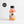 Load image into Gallery viewer, In the centre of the page is a single-serve cocktail in a cute looking small glass bottle, with a black aluminium cap. To the left of the page is a Great Taste producer logo. The cocktail is a Raspberry and Elderflower gin Collins and the label is red and white. In the centre is a circle and a picture which looks like Kate Bush in the centre, with a white background. The cocktail is a light red colour.
